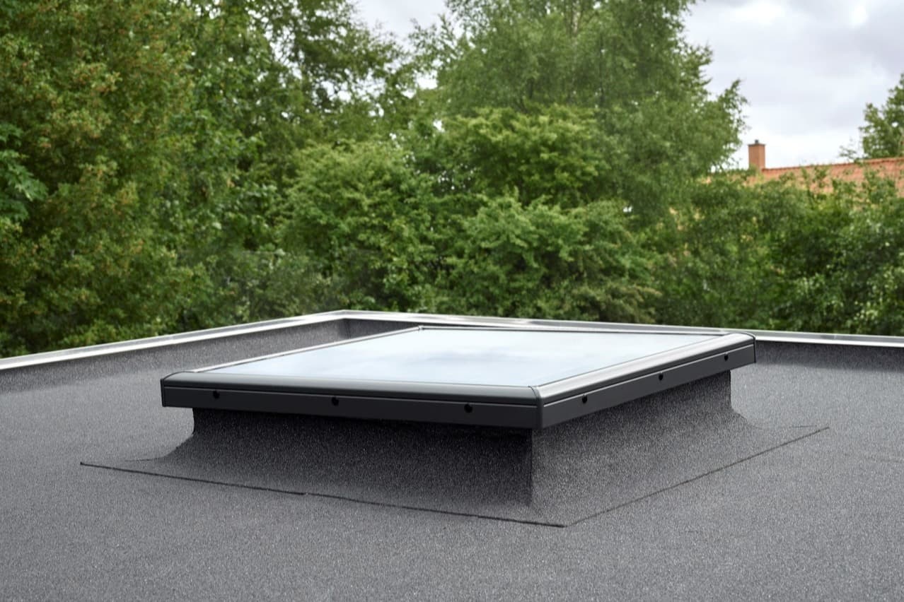 Flatt tak dagslys løsninger Neumann velux